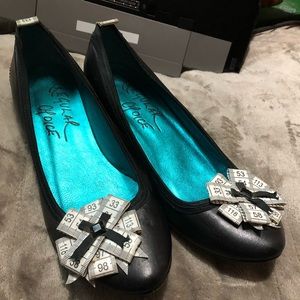 Size 8.5 Irregular Choice “Tapetastic” solid black leather Kitten Heel.